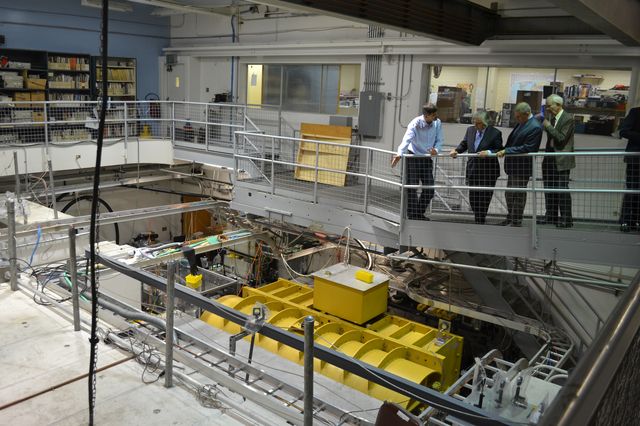 U.S. Secretary of Energy Ernest Moniz, second from the left, gets a look at the UCLA Particle Beam Physics (Neptune) Lab.