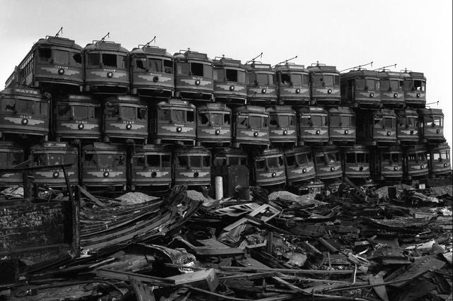 Old Pacific Electric Railway cars await their conversion into scrap metal at a junkyard on Terminal Island in 1956.