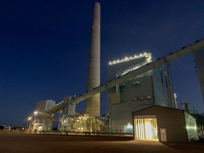 photo of an industrial building at night