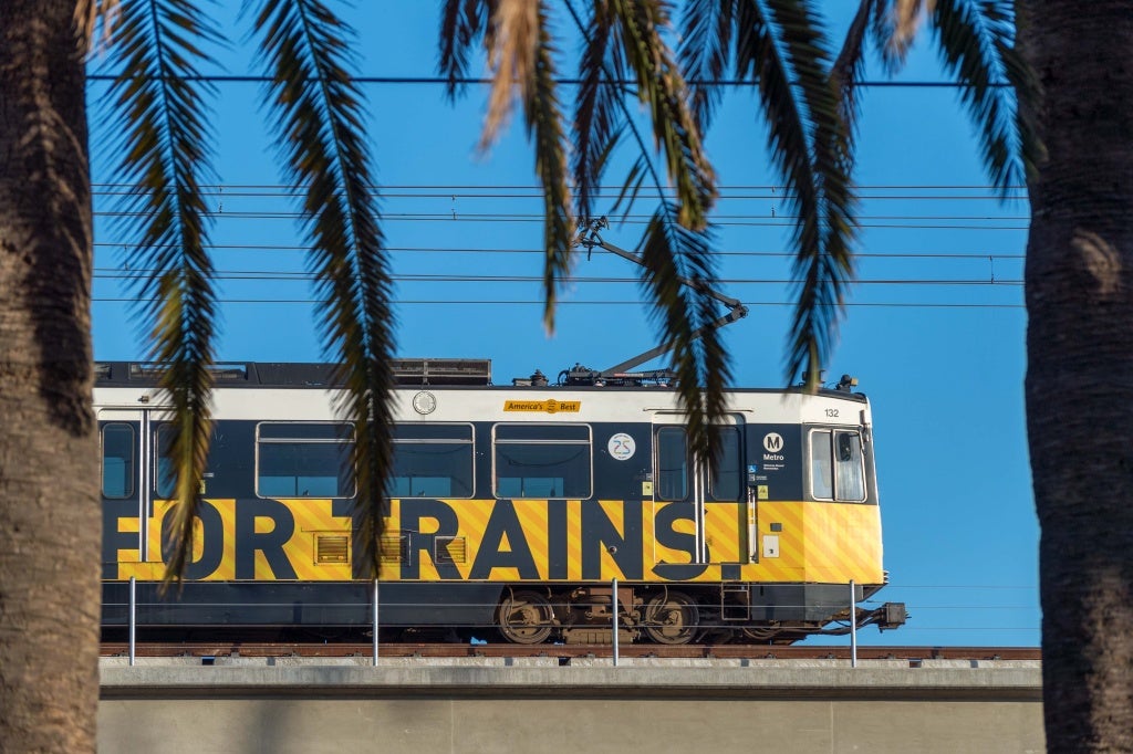 A test train runs above Pico Boulevard in Santa Monica along the new Expo Line extension on April 27, 2016.