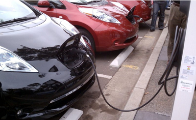 Residents will get help acquiring electric vehicles, such as the Nissan LEAF pictured at Balboa Park last year, through a new county program.