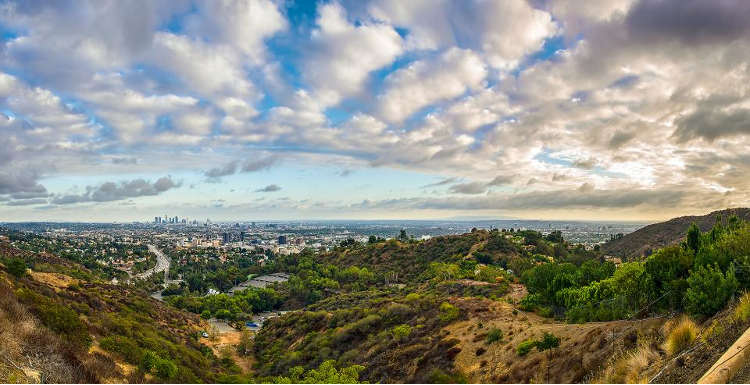 A view from the mountains of natural space with Los Angeles in the background