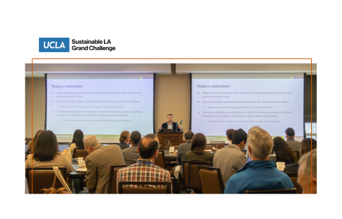 A person speaking to an audience from a podium