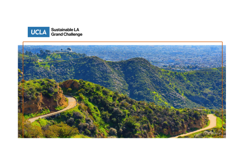A view of Los Angeles from the mountains with the skyline in the background