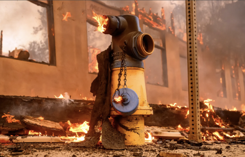 A fire hydrant on fire