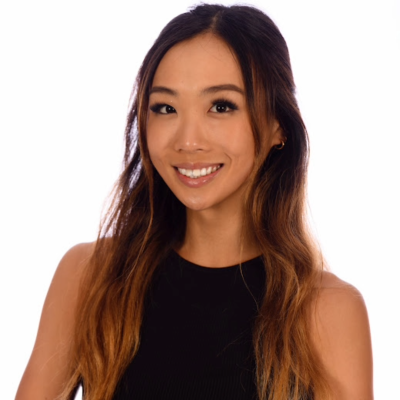 A young woman smiling at the camera.