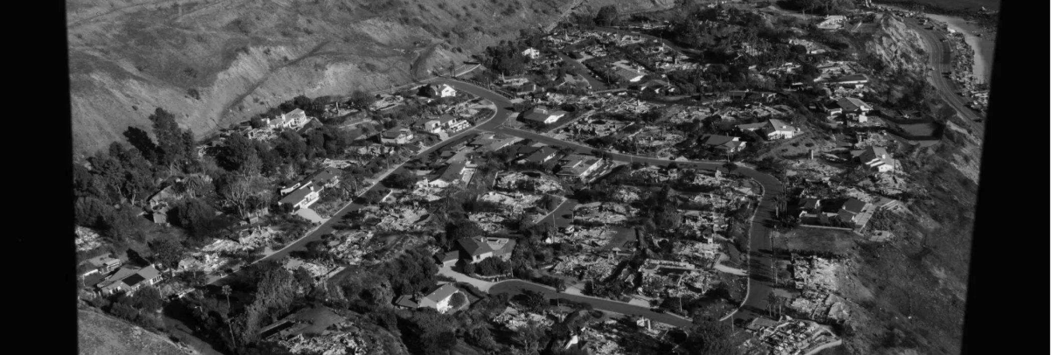 An aerial view of the burn area in the Pacific Palisades
