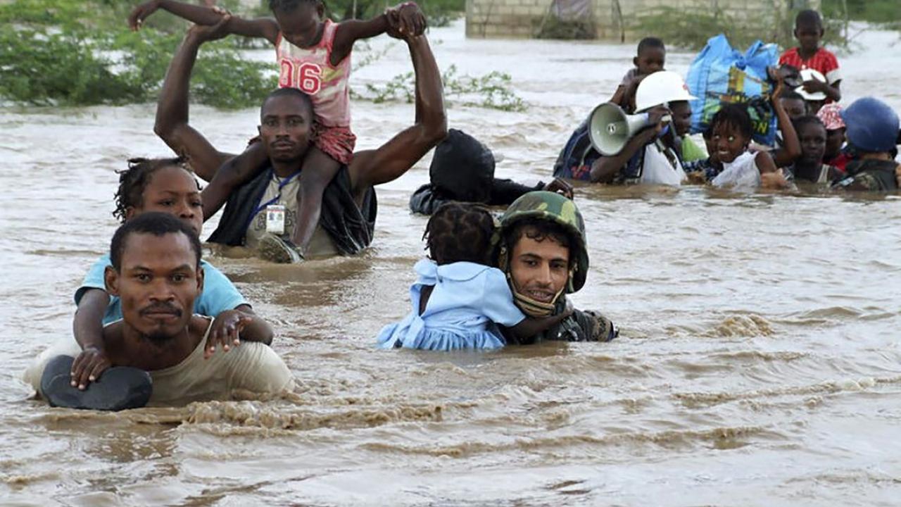 People being rescued from flood