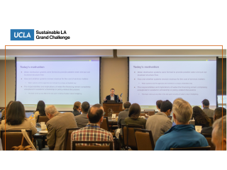 A person speaking to an audience from a podium