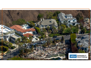 An overhead photo of a burned house surrounded by standing homes.
