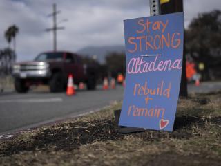 A hand-made sign that says Stay Strong Altadena